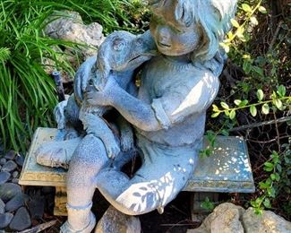 Bronze girl and puppy yard sculpture