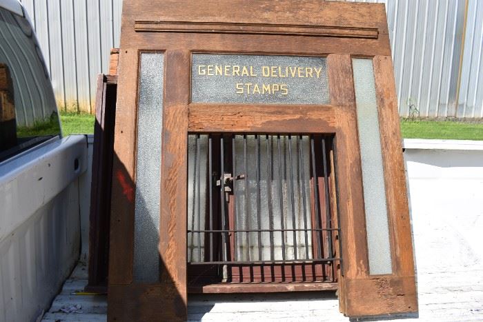 Sections of Antique United States Post Office complete with Windows, Signage, Grills, Mail Slots, Hardware and More! Section pictures taken outside and inside