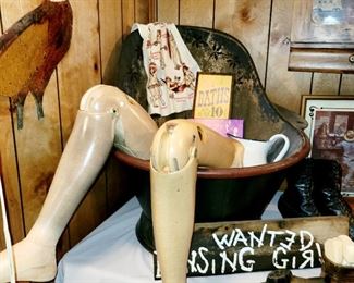 Prosthetic leg, vintage wash basin, signs,  soaps 
