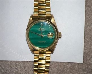 1978 Rolex Oyster Perpetual Datejust 18K Gold Watch in Case with aftermarket band and and aftermarket Jade 10K gold band, original box & Certificate of Appraisal.
1 crack (crazing) in dial from date window down 
Needs Cleaning
Serial # warn off in middle unsure if middle number is a 6 or 0. 