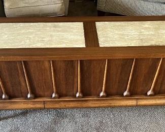 Could be an antique stereo but I don't see the speaker grilles, so I think it is a buffet or sofa table.