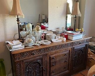 This is either a serving buffet table or a dresser. What would you do with it?