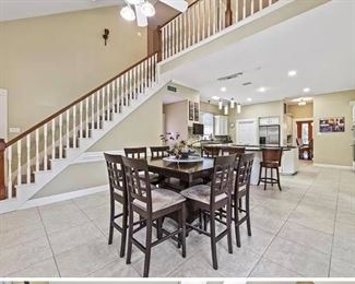 This lovely dining table contains Lazy Susan, plenty of storage and 8 solid chairs.