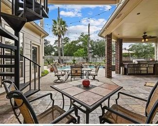 Cast iron patio table with 2 chairs