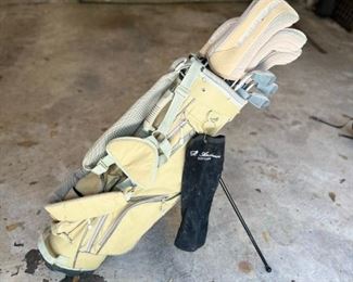 "Her" golf clubs