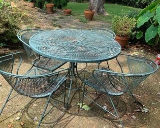 #26	Green Wrought Iron Round Patio Table w/4 chairs (1 chair as is seat) - 42" Round x29T	 $75.00 
