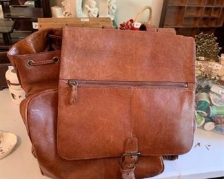 #99	Camel Leather Backpack w/drawstring (as is inside zipper/lining)	 $60.00 
