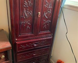 #138	 Cabinet w/bird Carving on Front w/4 drawers & 2 Doors 22x17x54	 $100.00 
