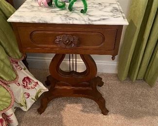 antique marble-top lair-base design table