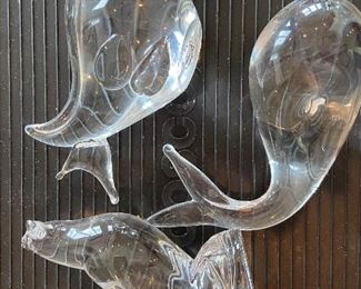 Murano glass fat fish and whale; cardinal is Baccarat