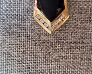 Close-up of Diamond Detail 0.29 ctw and Black Onyx 5.92 carets