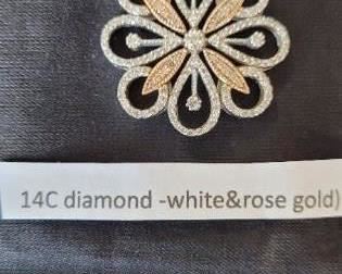 Diamond Floral Pendant stamped 14K white and rose gold with BH (maker's mark).  Diamonds round full cut at 1.25 ctw.