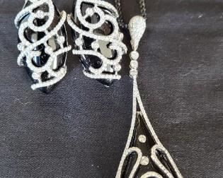 Onyx and Diamond Pendant/Enhancer & Earrings.  Earrings tested 14K white gold stamped ADAMOR (maker's mark).  35.43 carets marquise cut cabochon onyx & 1.34 round cut diamonds ctw.