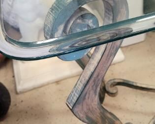 beveled edge of heavy glass tables