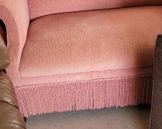 vintage fringed camel back settee