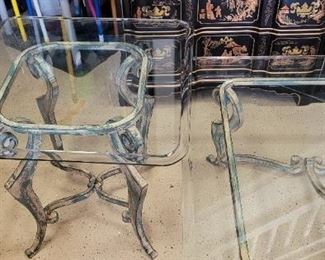Very heavy beveled glass top tables with green painted iron bottoms