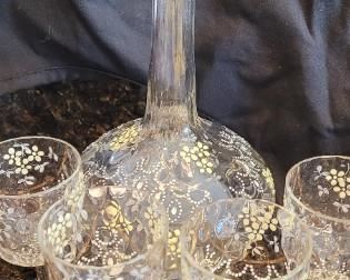 Vintage painted decanter and four cordial glasses