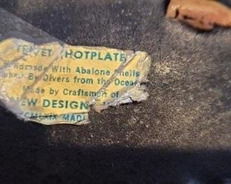 label for vintage New Designs Lucite trivets