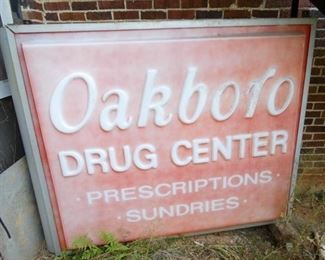 PLASTIC EMB. OAKBORO DRUG CENTER SIGN