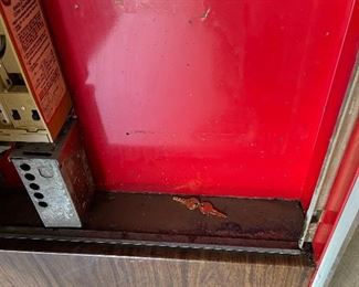 Inside of the 70s Coke  machine