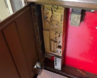 Inside of 1970s Coke machine
