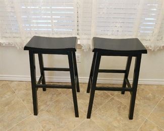 Pair of black counter height stools