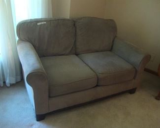 Loveseat w/ taupe upholstery
