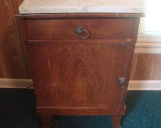 Antique night stand with lion head pulls