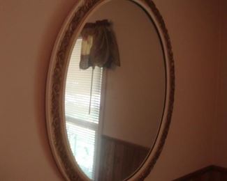 Oval mirror with gilded frame