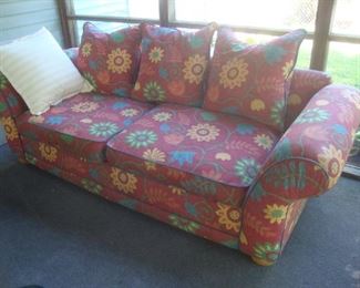 Sofa with sunflowers on upholstery
