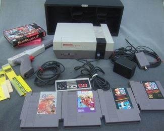 Nintendo system with zapper gun and games