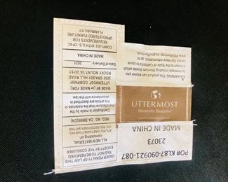 UTTERMOST leather finish trim chair