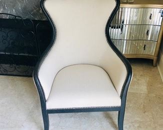 UTTERMOST leather finish trim chair