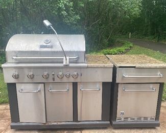 Master Forge Outdoor Gas Grill and Refrigerator. The grill has not been used for awhile as it needs a new igniter switch. The client reports, it can be lit with a lighter. The fridge section has some broken trim of which a portion is included and could be repaired. Please see all photos. 

This grill has not been tested and is sold as-is for repair. The refrigerator is in working condition. 

Grill section measures 50" w x 27" d x 36" h with the refrigerator section measuring 25" x 27" x 36" 