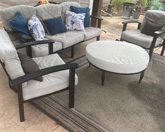 Better Homes and Gardens Four Piece Patio Set. Lovely set with some wear consistent with outdoor use including some moisture stains on the cushions. 

Sofa measures 80" x 31" 

Two Chairs each measures 33"w x 32" d. Seat dimensions are 26" x 27"

Ottoman features a zip off cover that can be laundered and measures 38" in diameter