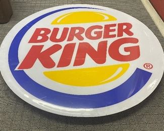 Round Plastic Burger King Sign with wear including scrape/scratch marks and some color/paint loss. Measuring 7'