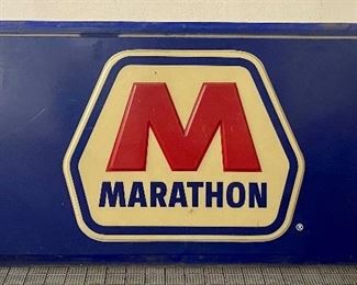 Marathon Molded Dimensional Plastic Sign in good condition with some wear including scrape/scratch marks. Measuring 77" x 38" 