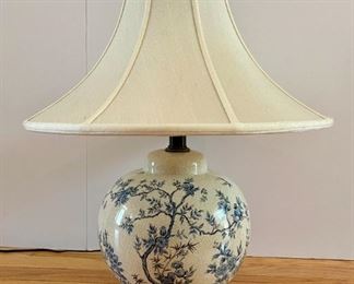 Porcelain Table Lamp With Blue Cherry Blossom Motif And Asian Inspired Finial On Metal Base
Lot #: 58