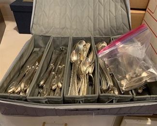 Sterling Silver flatware  and several serving pieces.