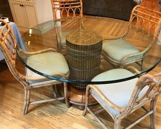 Great vintage bamboo glass top table with 6 matching bamboo chairs.