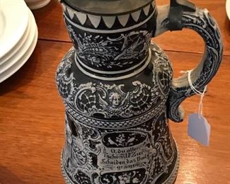 LARGE saltwater lidded stein. Some damage to rim.