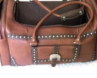 Great tooled leather bag with silver buckle