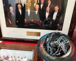 Museum of flying globe award and matching photo, gifted to Jim Lovell