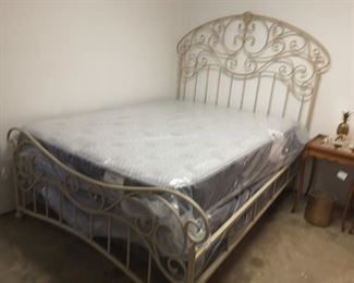 Queen size wrought iron bed with new mattress set