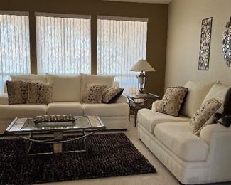 Plush Ivory Recessed Arm Sofa and Loveseat, Coffee Table, 2 End Tables and Sofa Table, Table Lamps, Area Rug