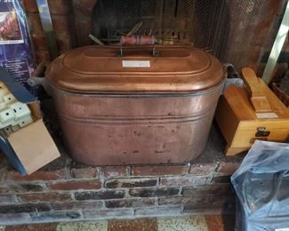 Vintage Copper Boiler w/lid and wood handles. Also, in the picture to the right of the boiler is a wood shoeshine kit complete with cleaning items.