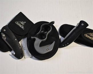 Two Gerber Folding Knives and a Gerber EZ Zip Gut Hook Tool with Extra Blades