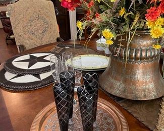 Champagne flutes, copper tray and floral in copper pot