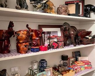 Leather coated animals, animal figurines, frames, leather boxes, new clocks, games, candle holders with candles, wood boxes, inspirational cards in boxes, horn magnifying glass