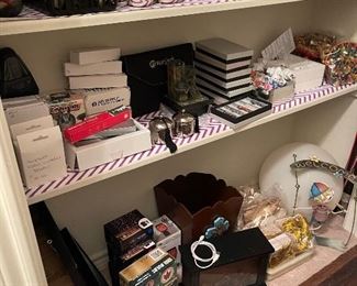 Christmas lights, wood trash bin, large white lamp, storage gift boxes, small fountains